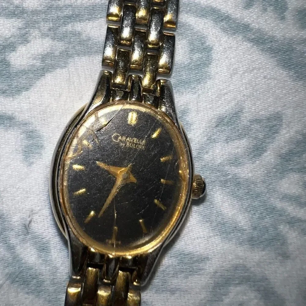 Bulova watch women’s style thin clock gold